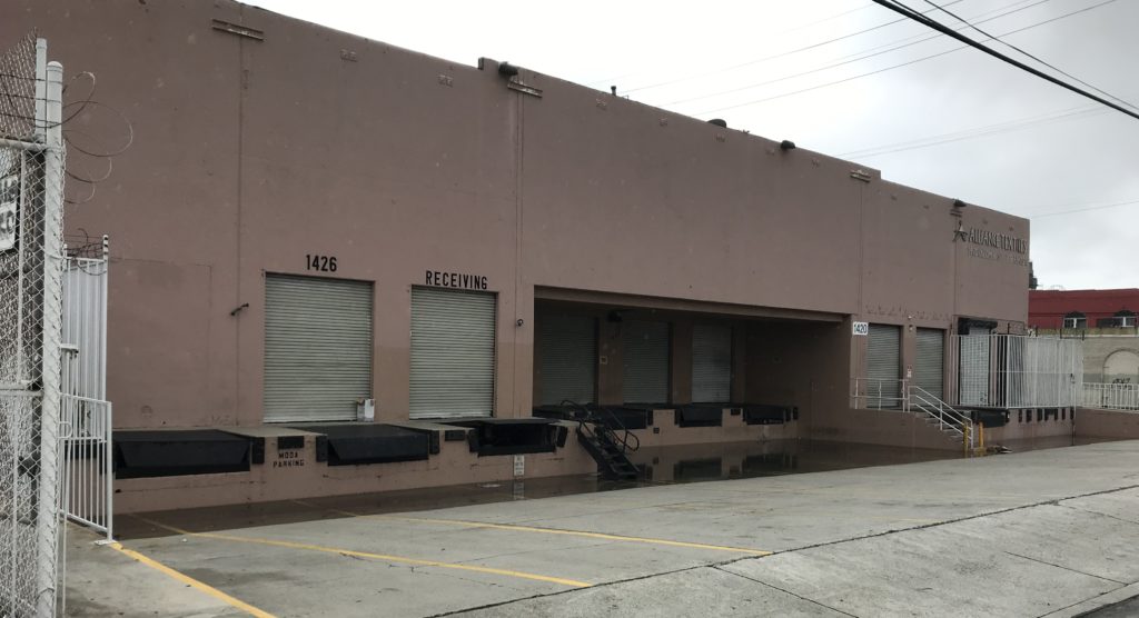 A photo of a warehouse building at 1426 Paloma Street