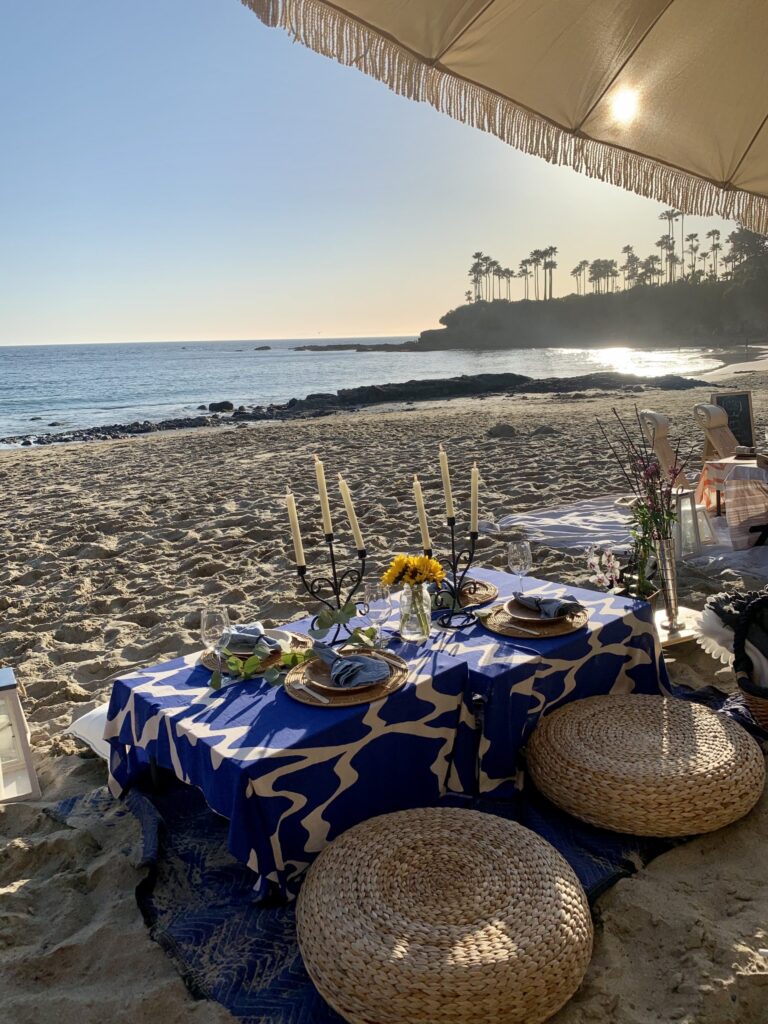 A photo of a picnic setting on a beach