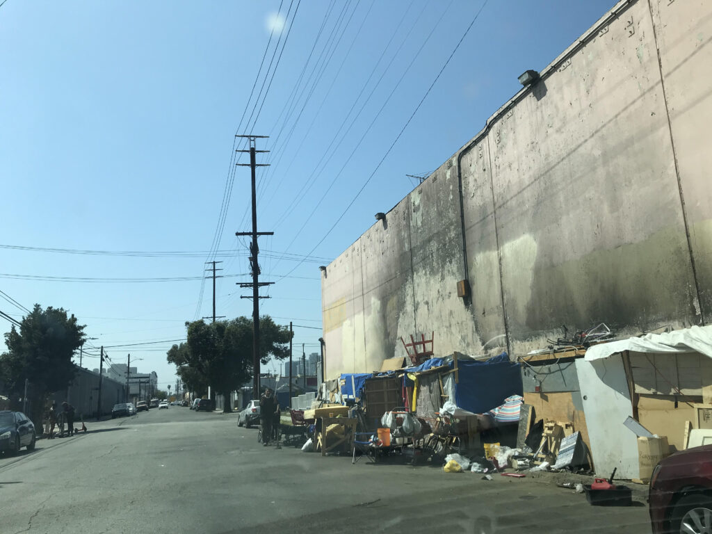 A row of homeless people's tents along Paloma Street as of May 5, 2021