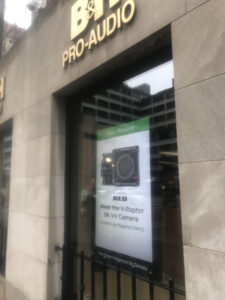 A photo of the Red camera ad on the B&H store window